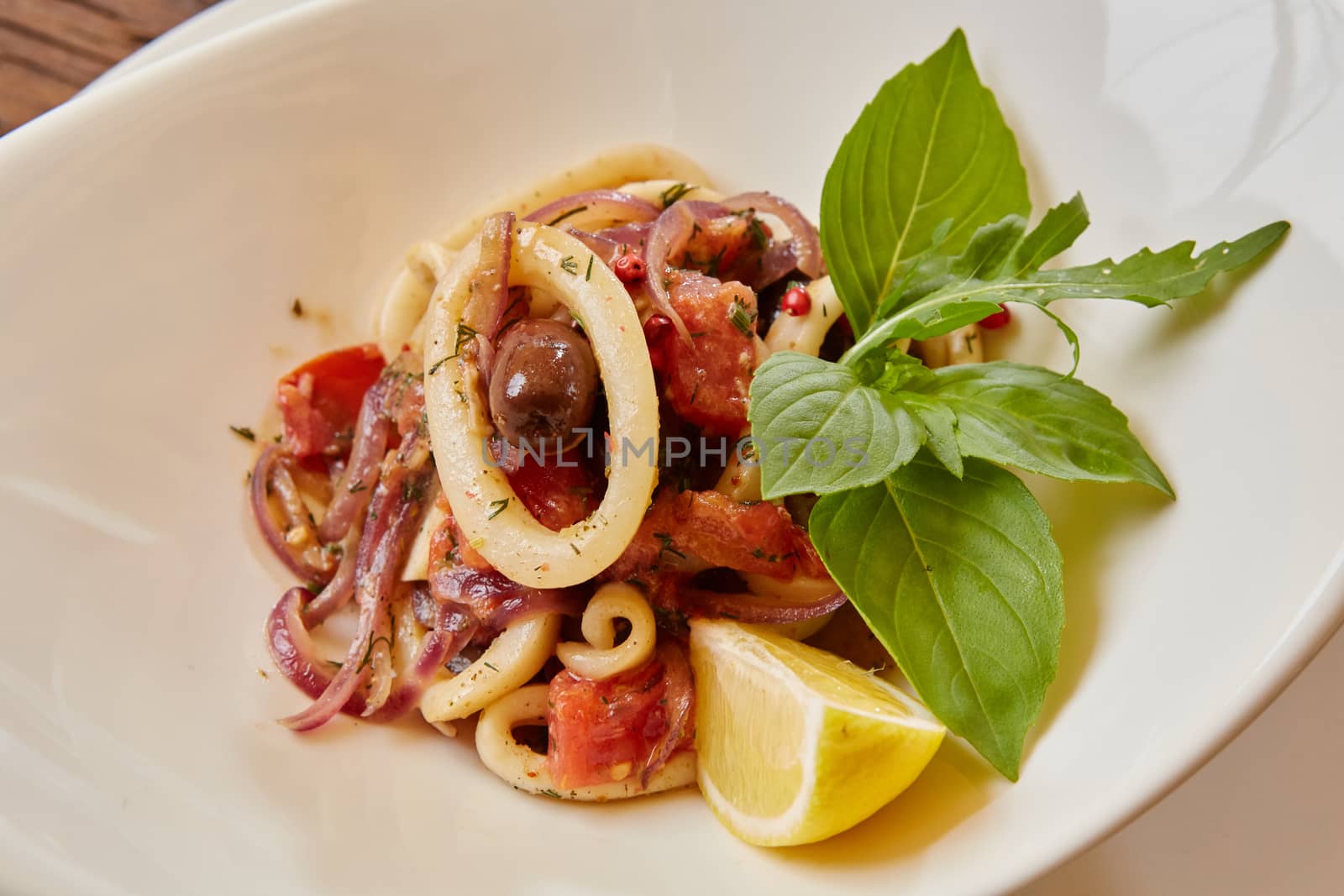 Seafood Salad with Shrimps and Squid Rings. Shallow dof