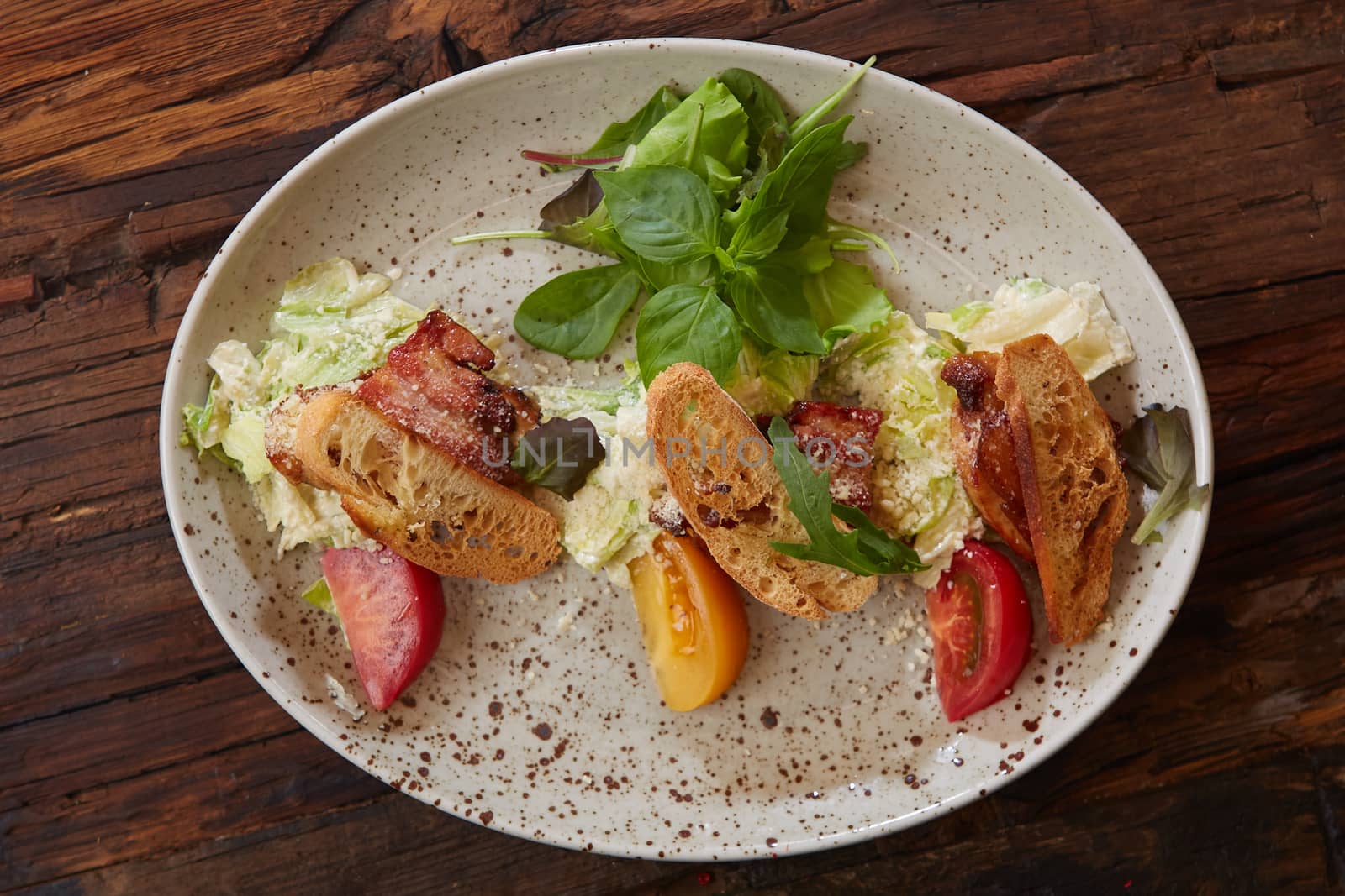 Fresh healthy Classic Caesar salad on plate.