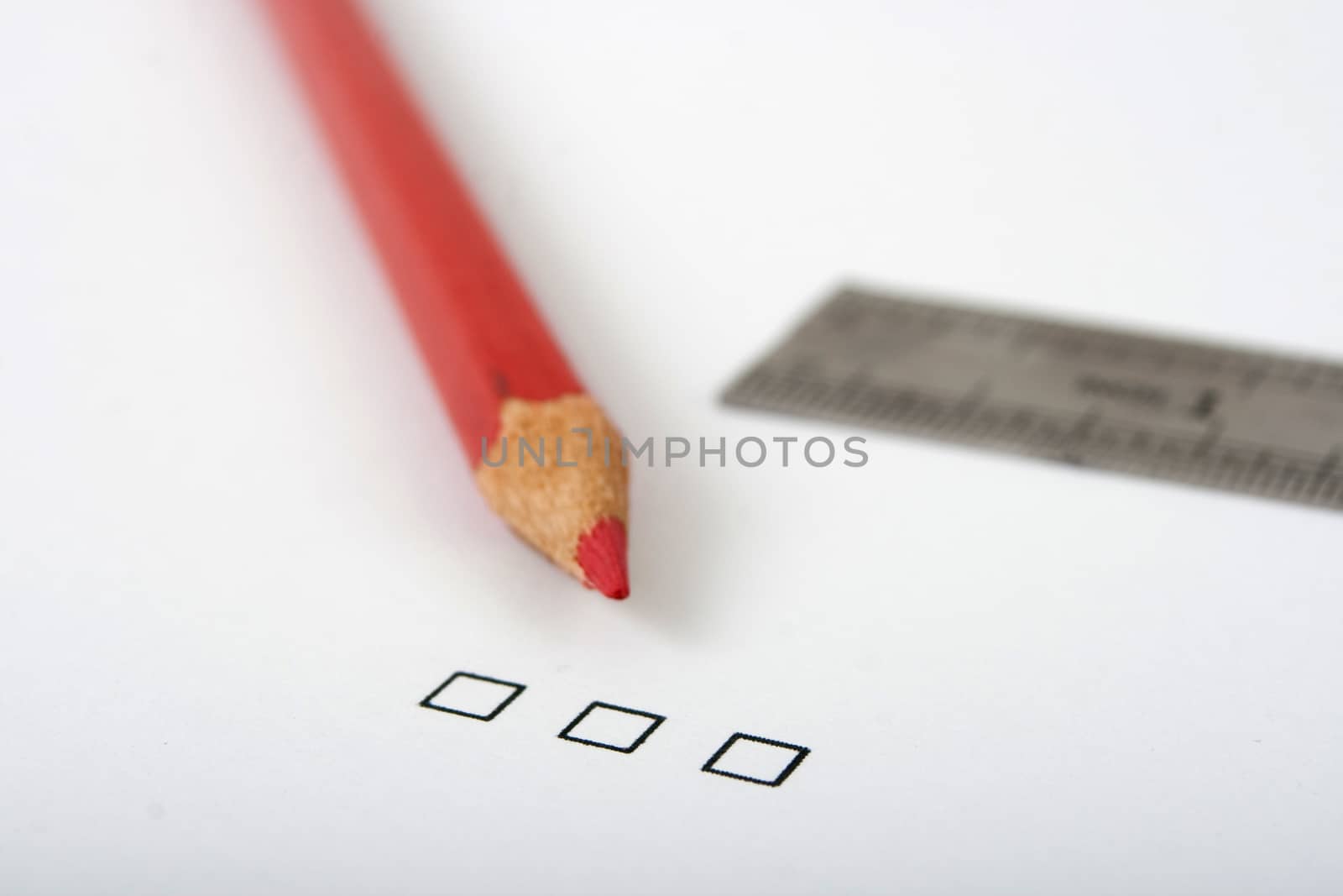 black checkbox white page red pencil and a ruller