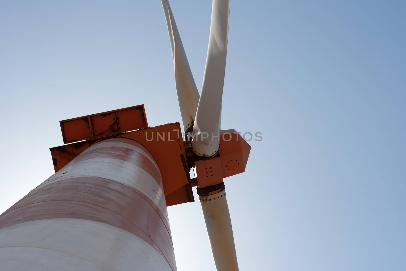 electric power generating wind turbine in the summer