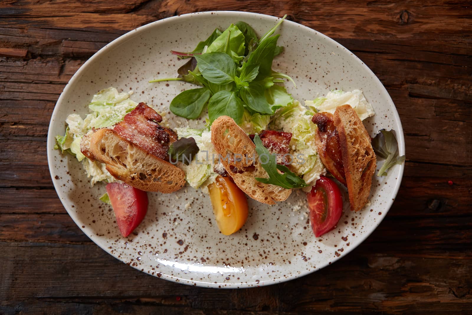 Fresh healthy Classic Caesar salad on plate.