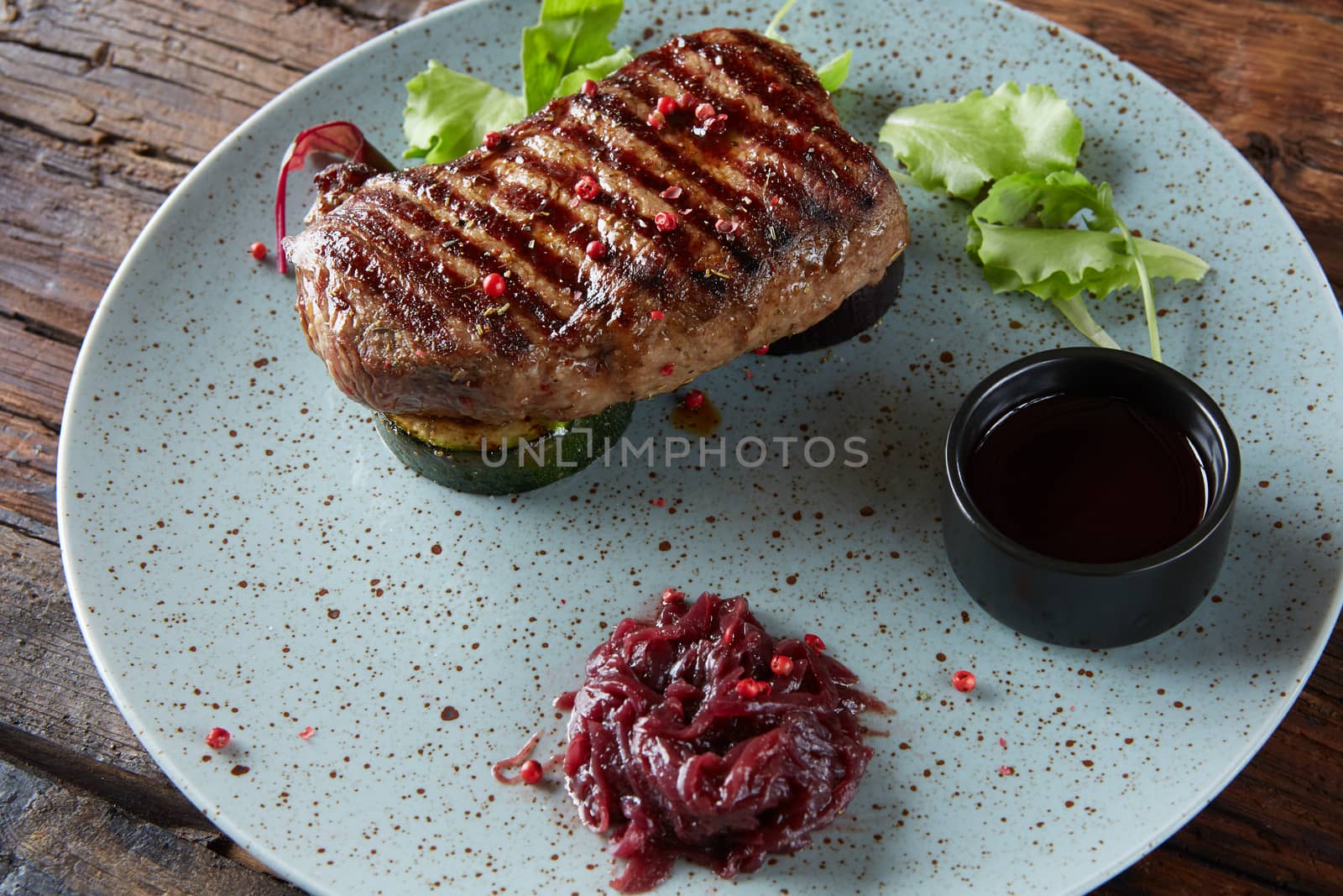 The beef steak on plate. Shallow dof