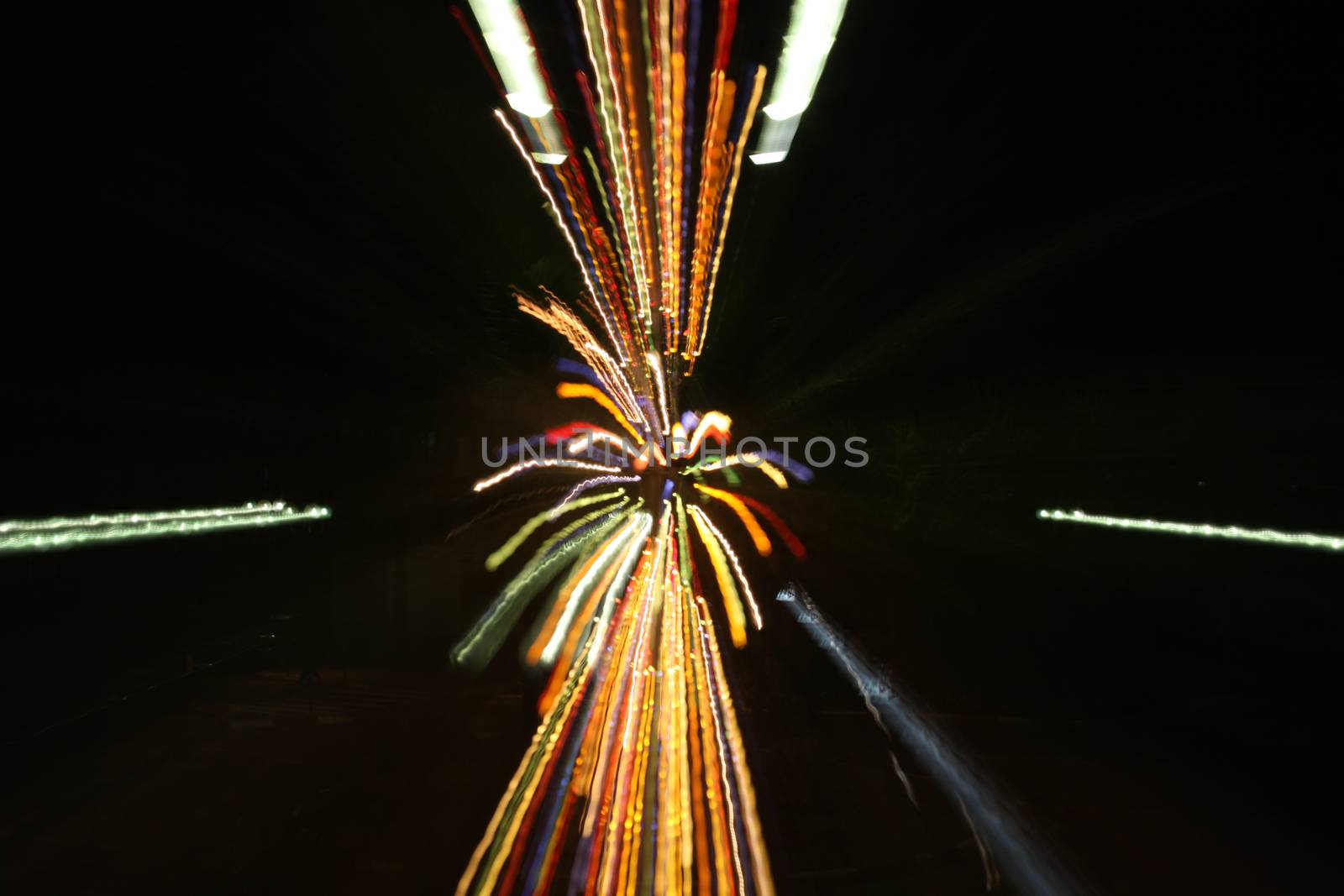 abstract colored light trails in the night with movement