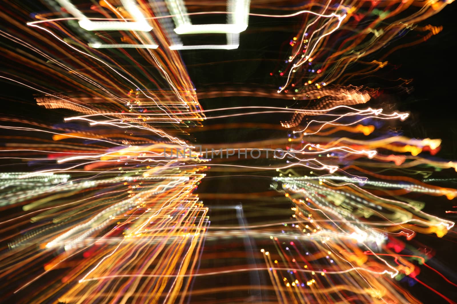 abstract colored light trails in the night with movement