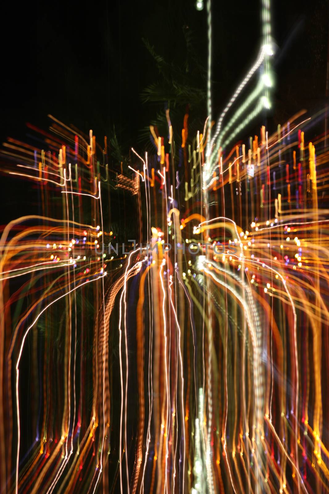 abstract colored light trails in the night with movement