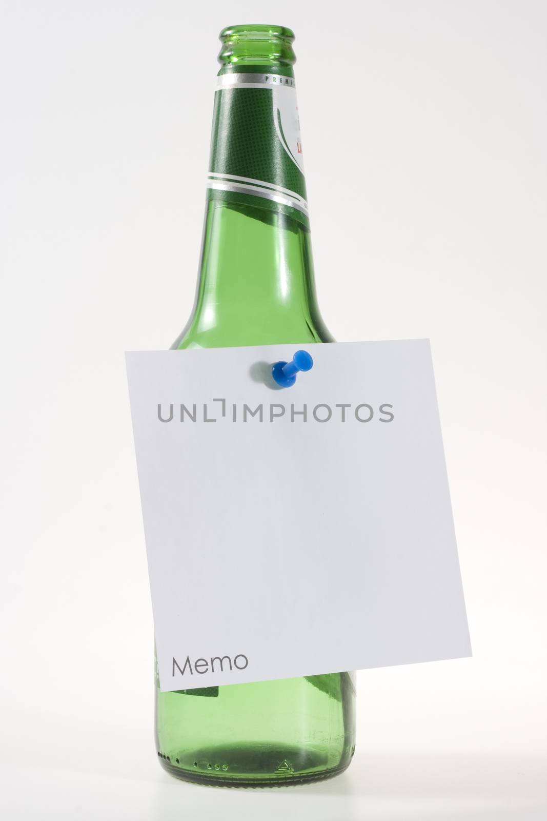 beer bottle with white memo note