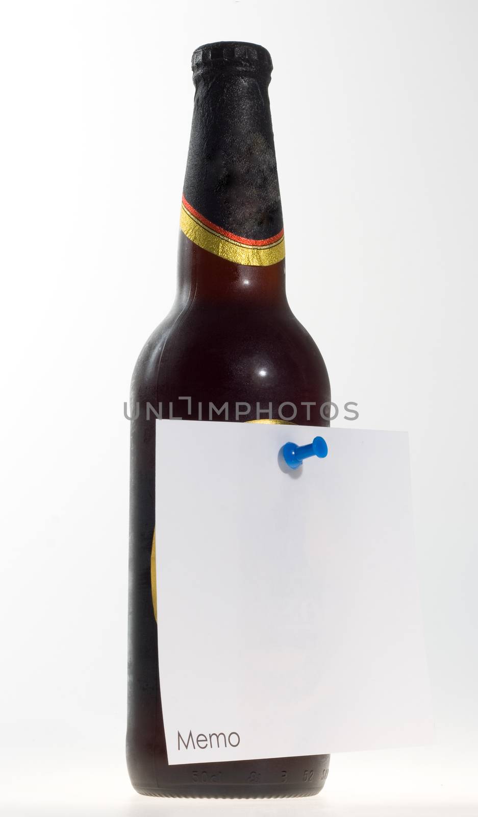 brown beet bottle with memo note attached with a pin
