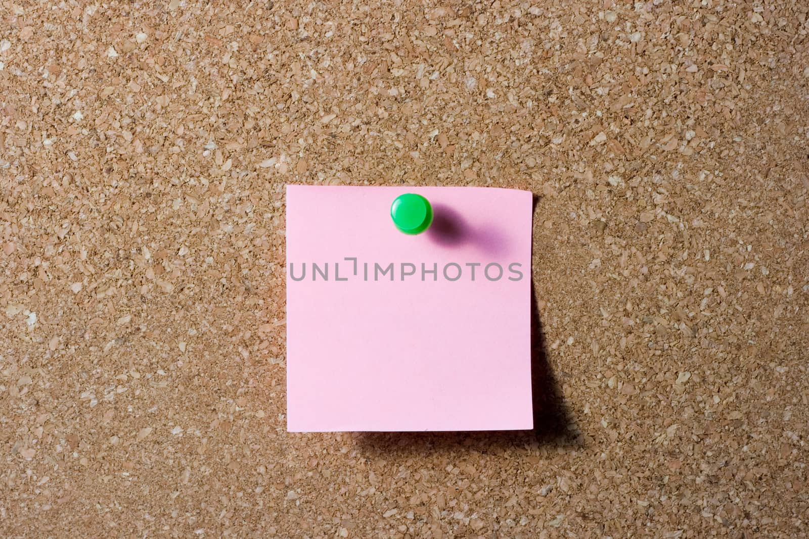pink note with green push pin