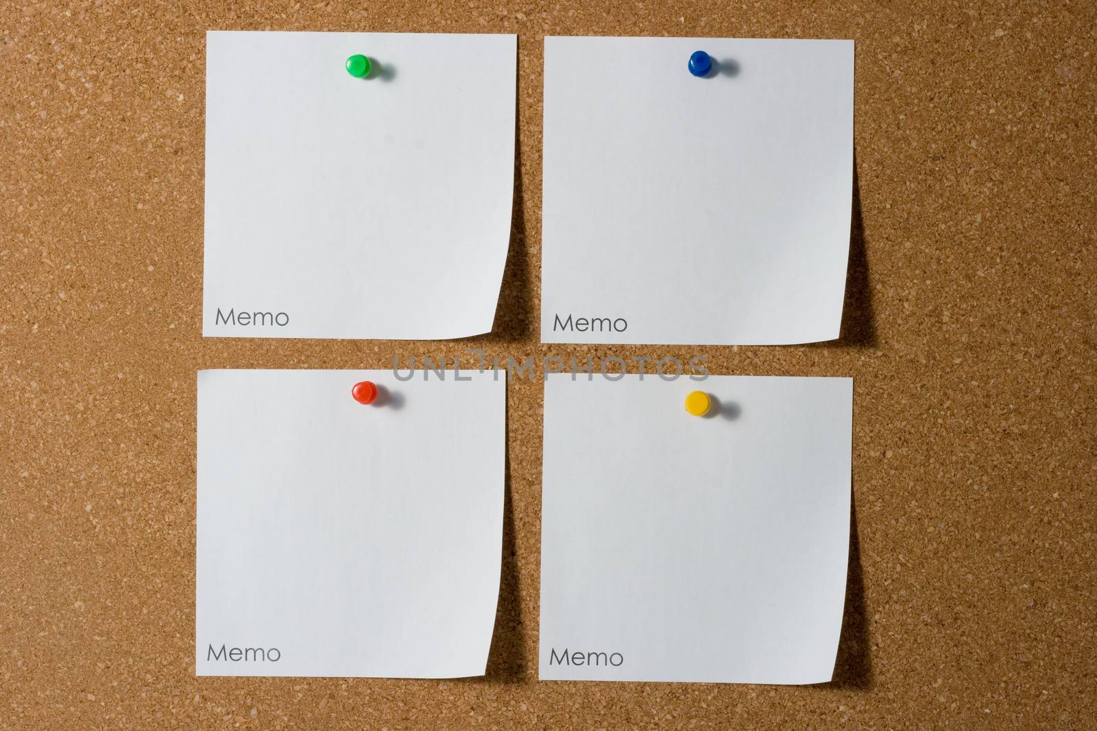 four reminders with colored thumbtack