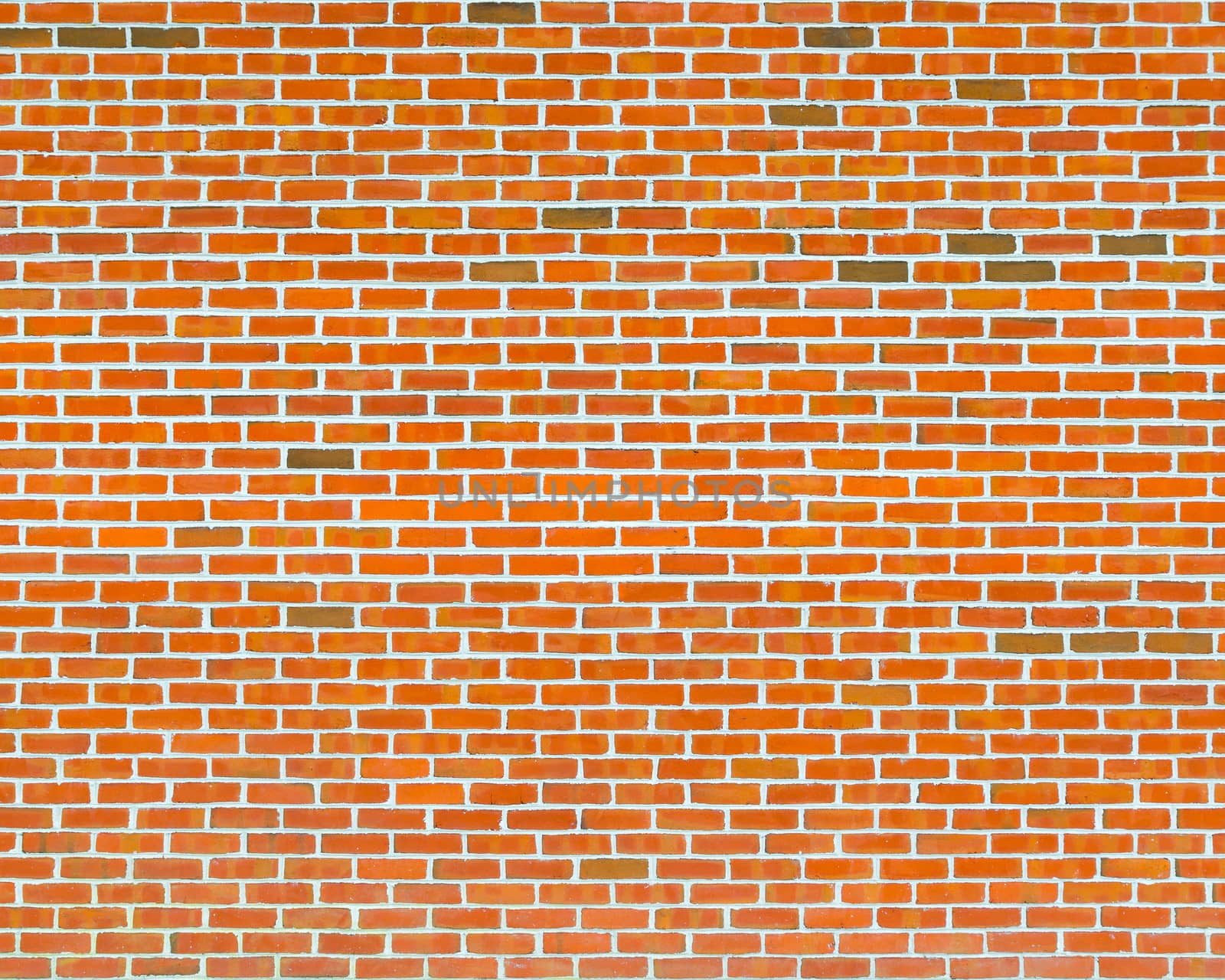 Orange brick wall texture with white joints