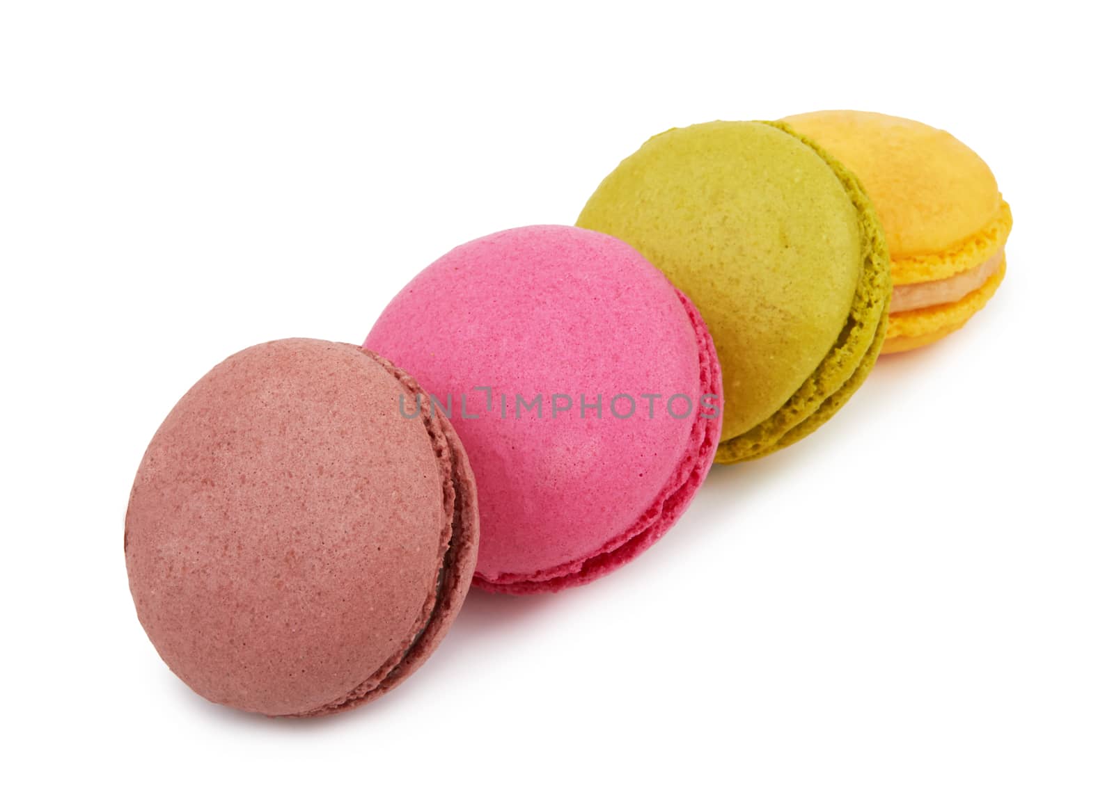 french colorful macarons isolated on white background