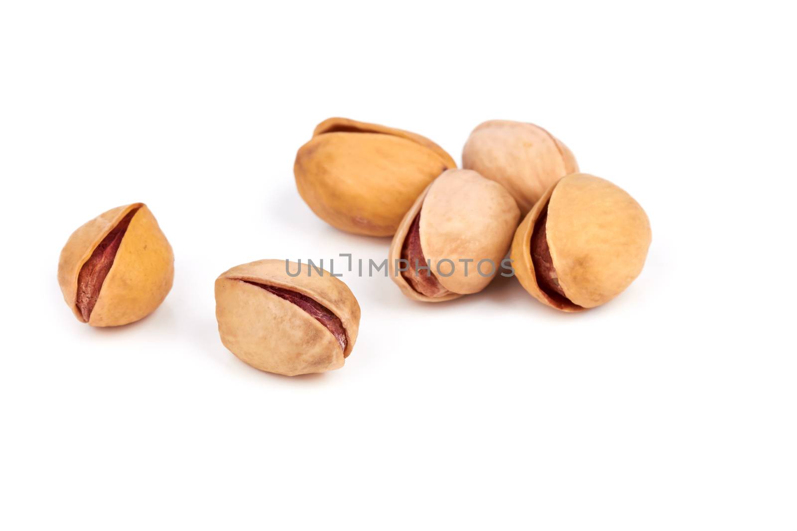 pistachios heap isolated on a white background