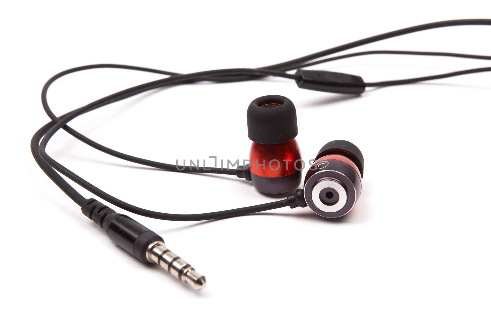 Modern portable audio earphones isolated on a white background 
