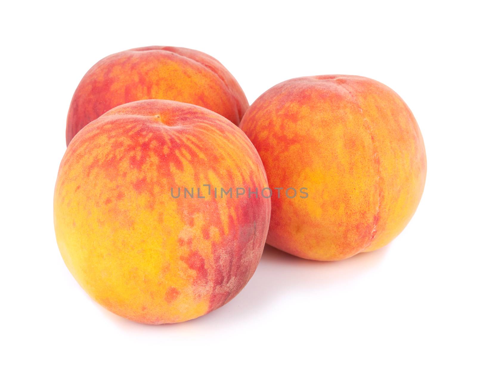 Fresh sweet peach on a white background