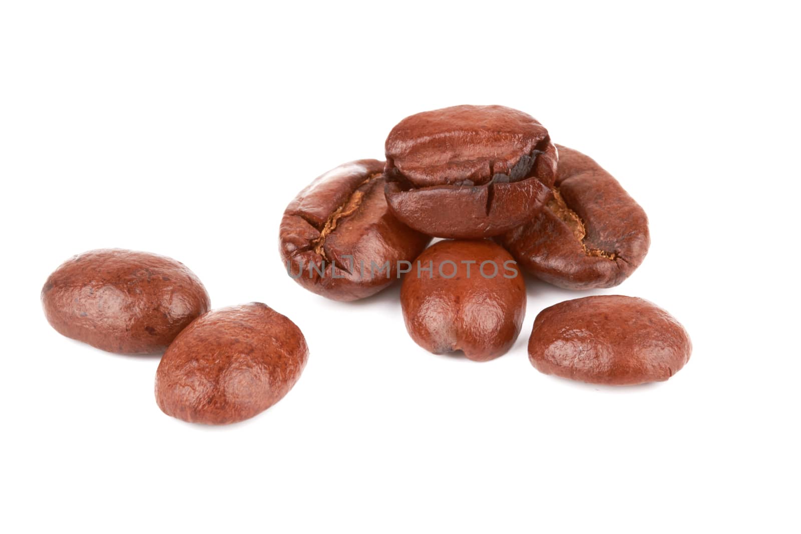 Brown coffee beans on a white background 