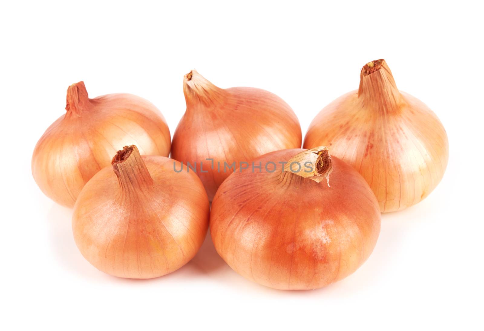 Gold onion bulbs isolated on white background