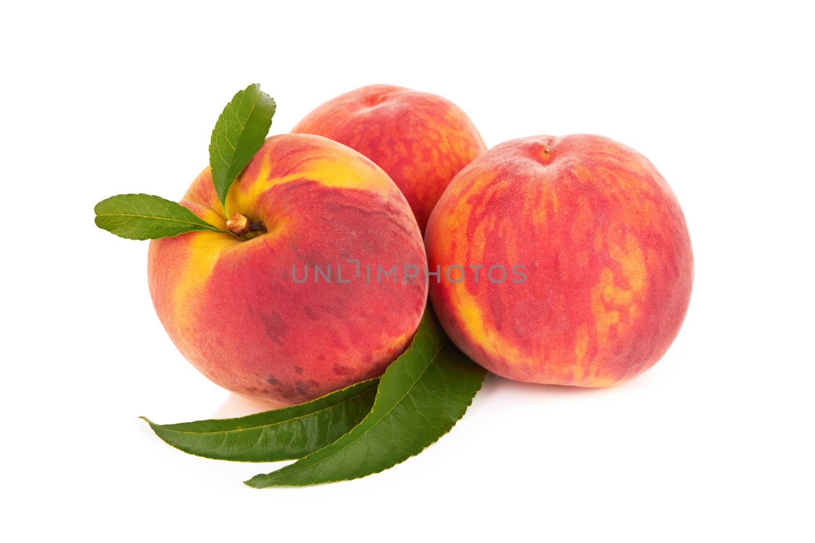 Fresh sweet peach on a white background