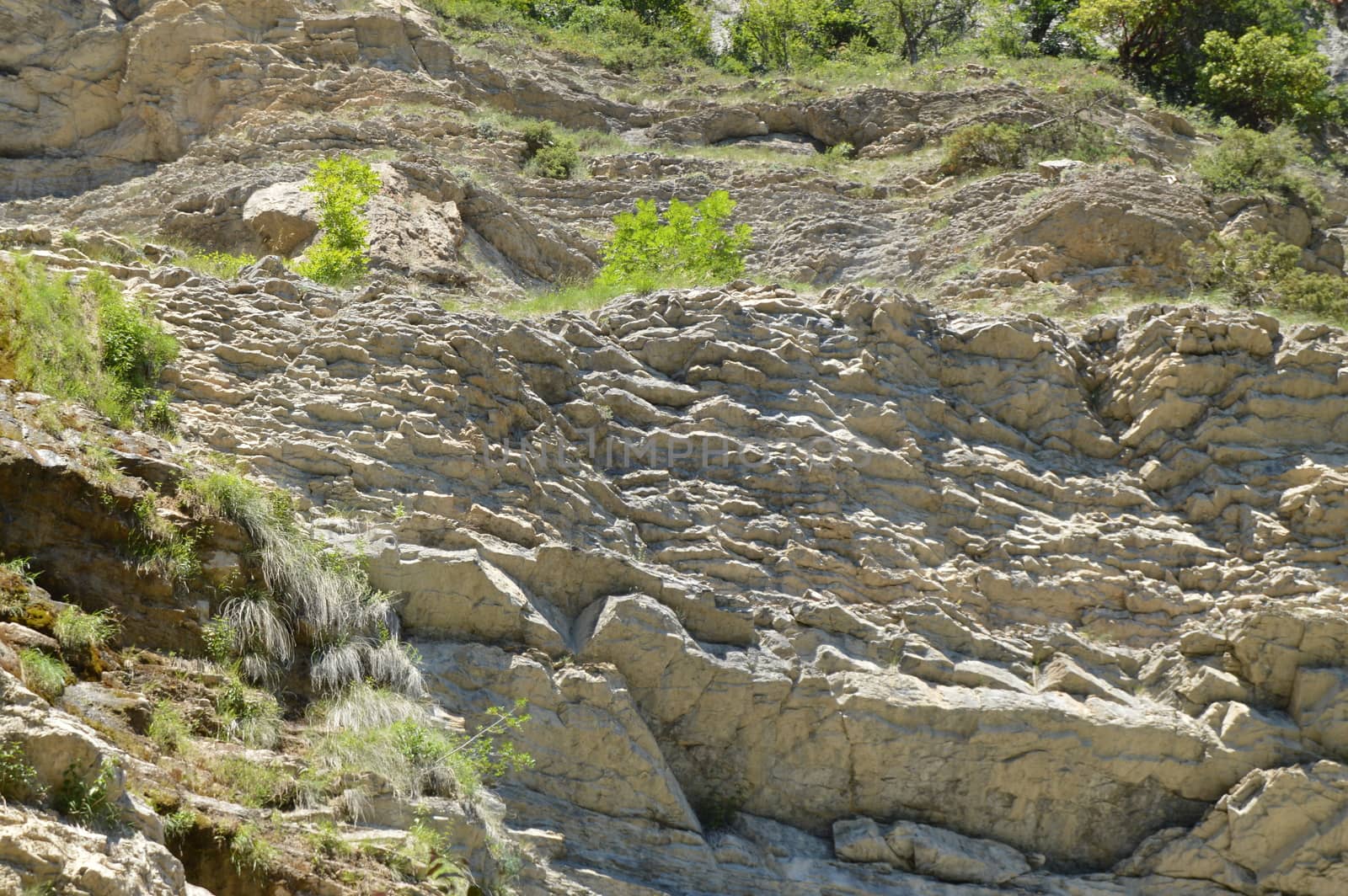 Bottom view of rocks and mountains, the concept of ecosystem conservation and untouched nature.