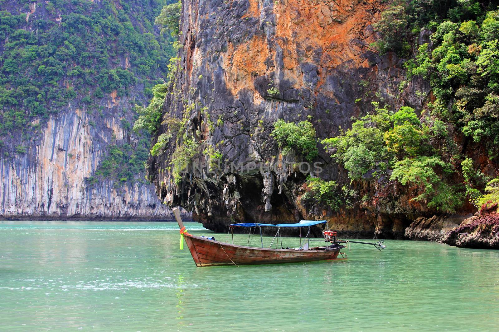 Thai traditional wooden longtail boat and beautiful ocean