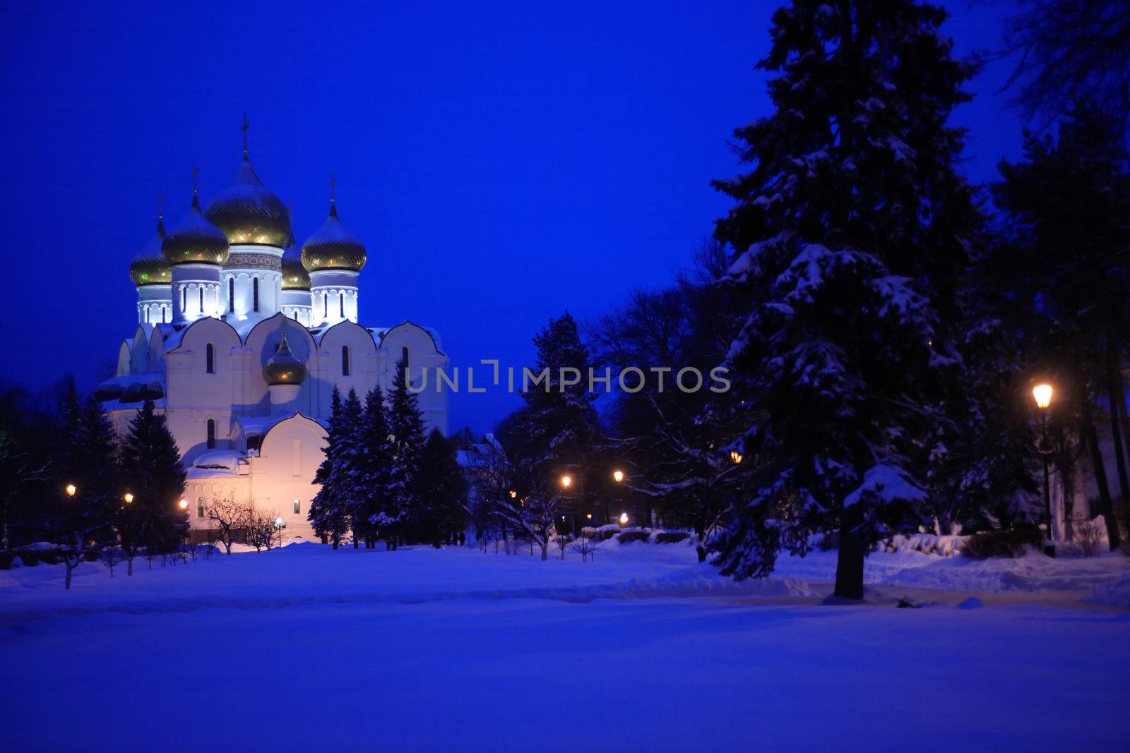 Nice winter landscape at night with white classical Russian church