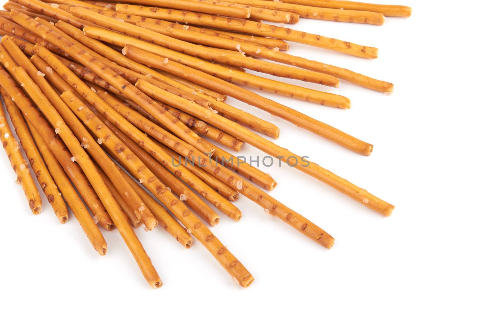 pretzel sticks on white by pioneer111