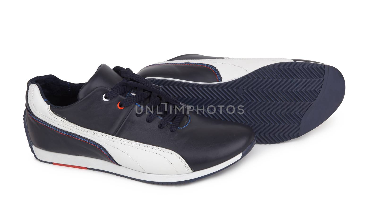 Sport shoes on white by pioneer111