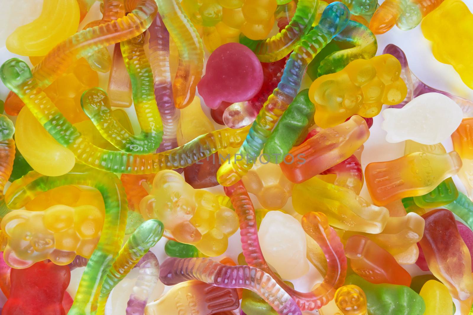 colorful neon gummy candies use as a background