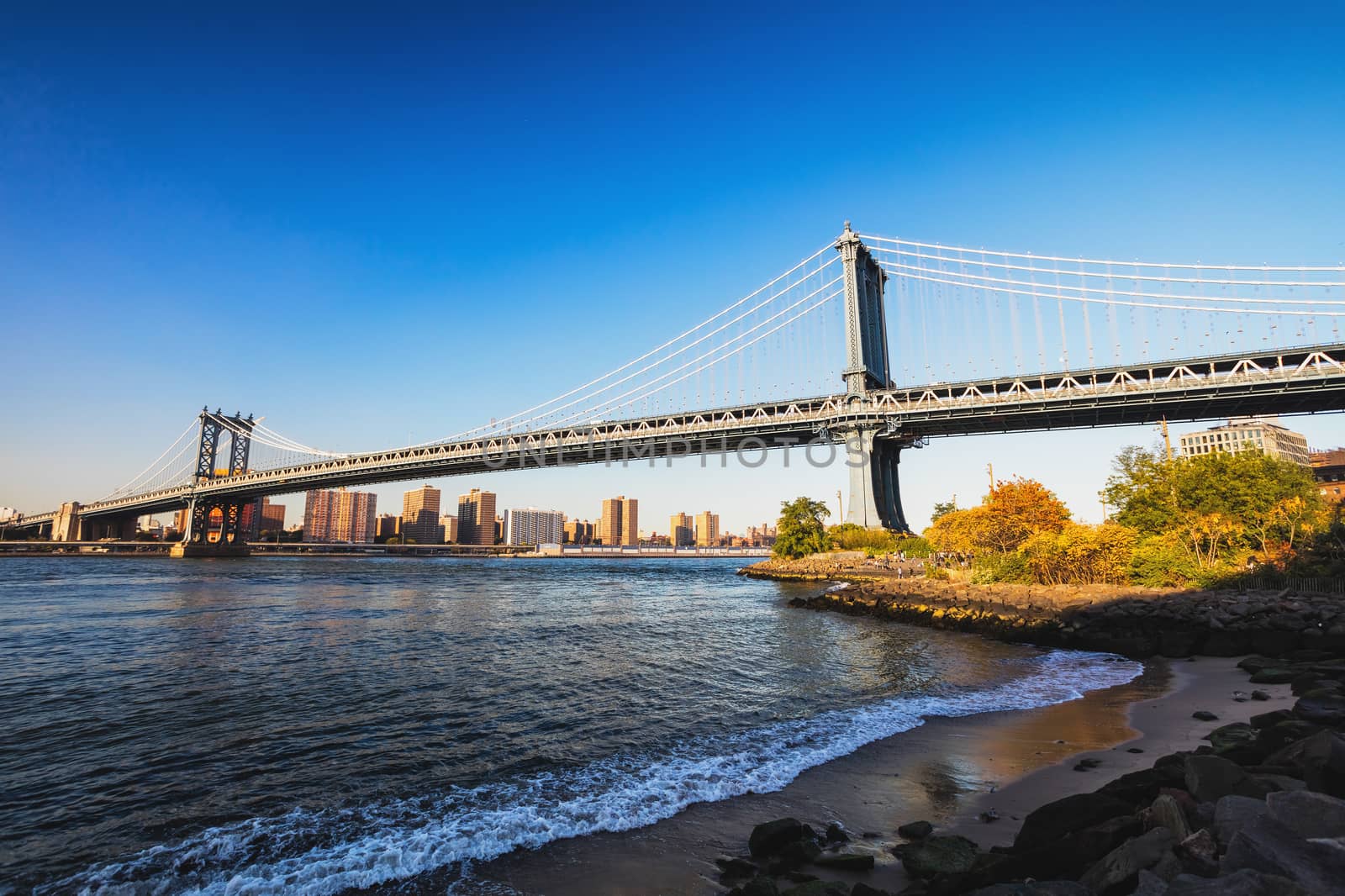 Manhattan Bridge in New York with Downtown