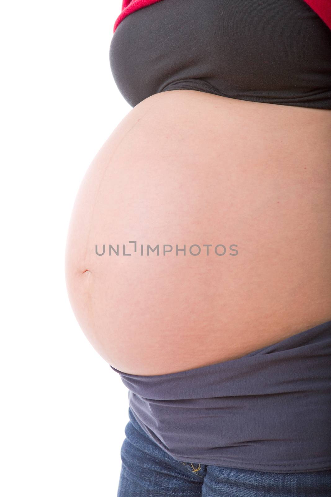 Closeup of pregnant woman at white background