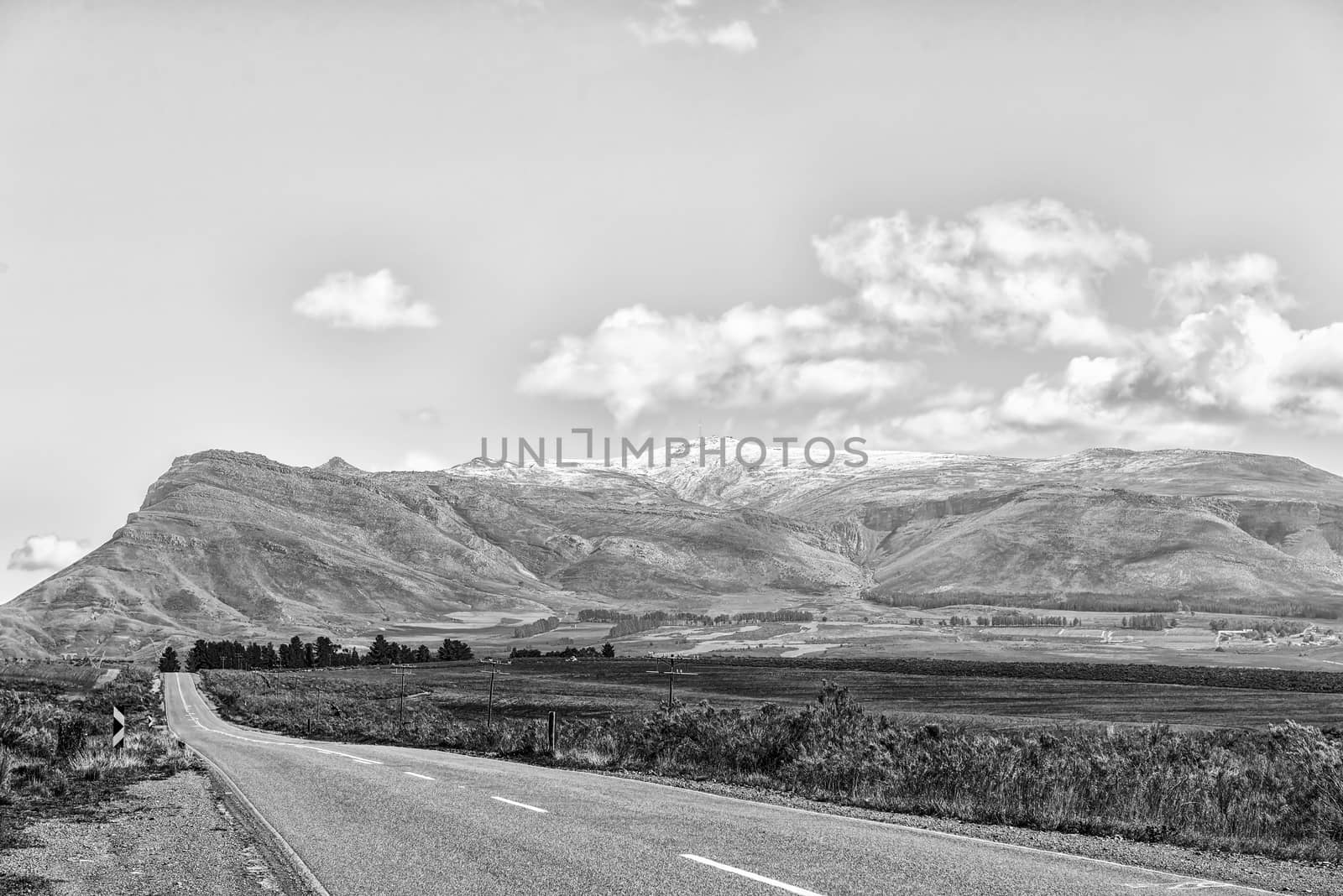Monochrome landscape on road R46 near Ceres in the Western Cape Province. Snow is visible on the Theronsberg Mountains