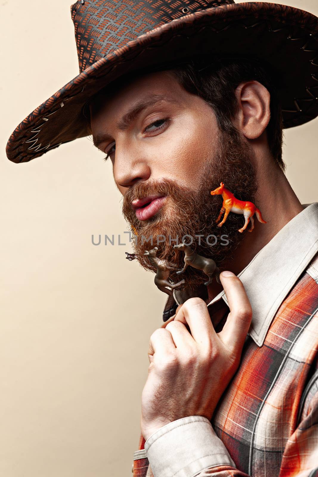 Man in a cowboy hat by Multipedia