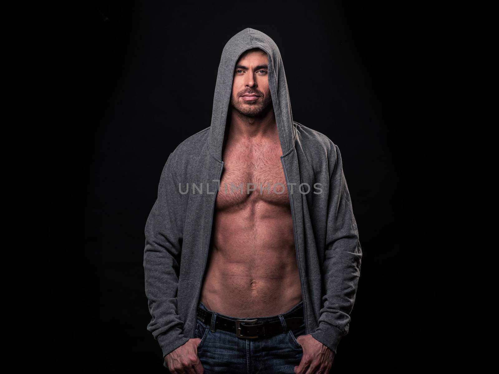 Muscular man in gray hoodie by ALotOfPeople