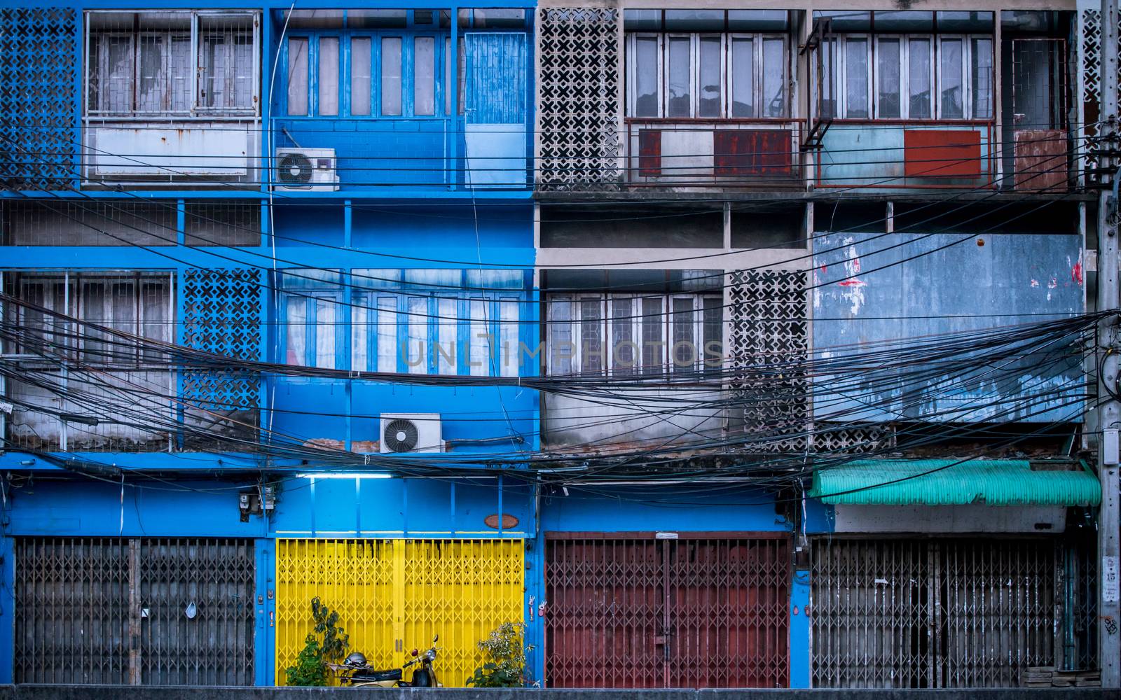 Facade of an old row house in Bangkok, Thailand