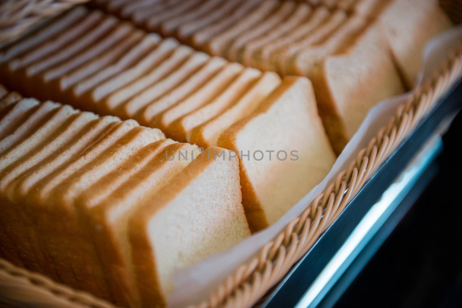 row of sliced bread in basket