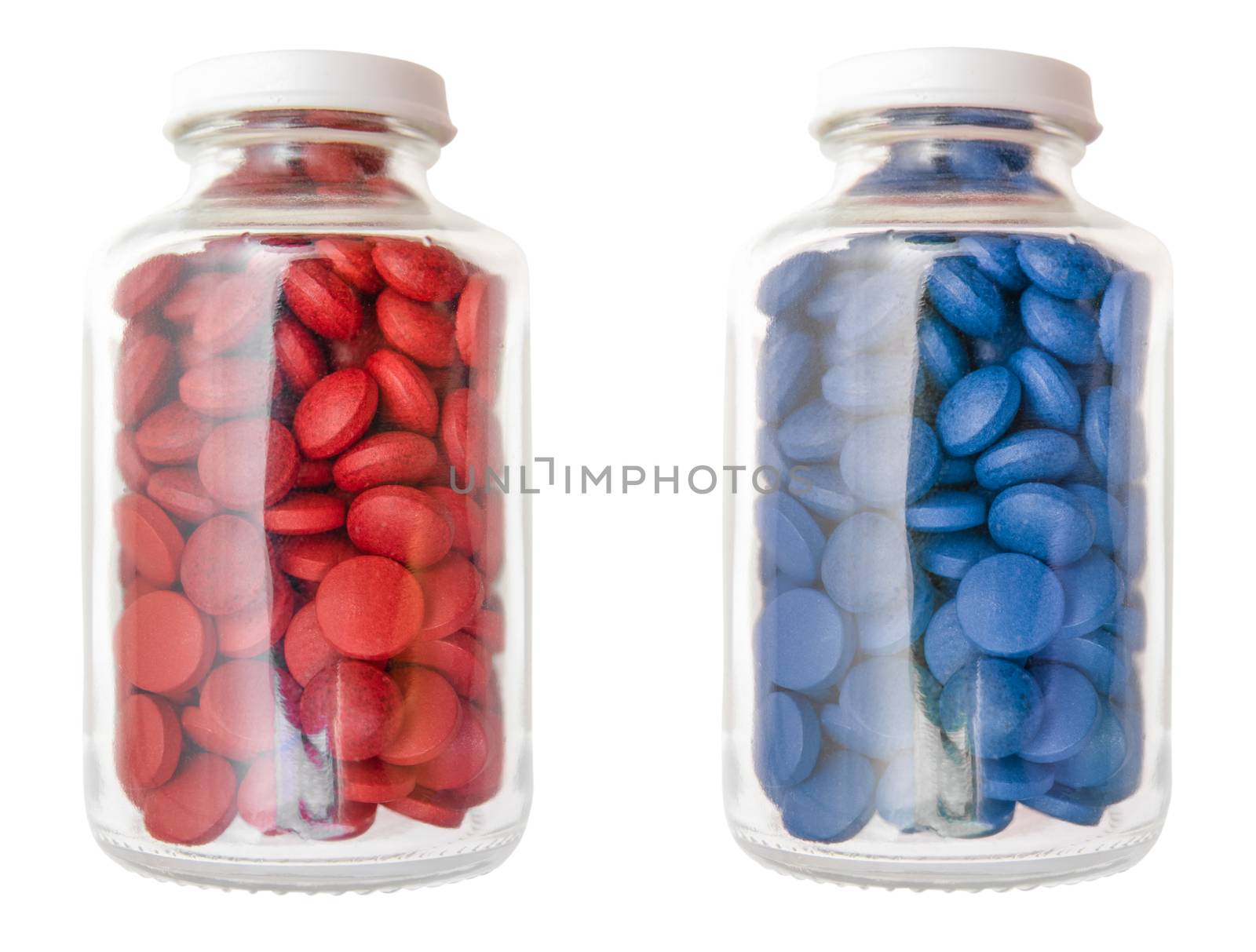 Red And Blue Pills Or Tablets In Glass Containers Isolated On A White Background