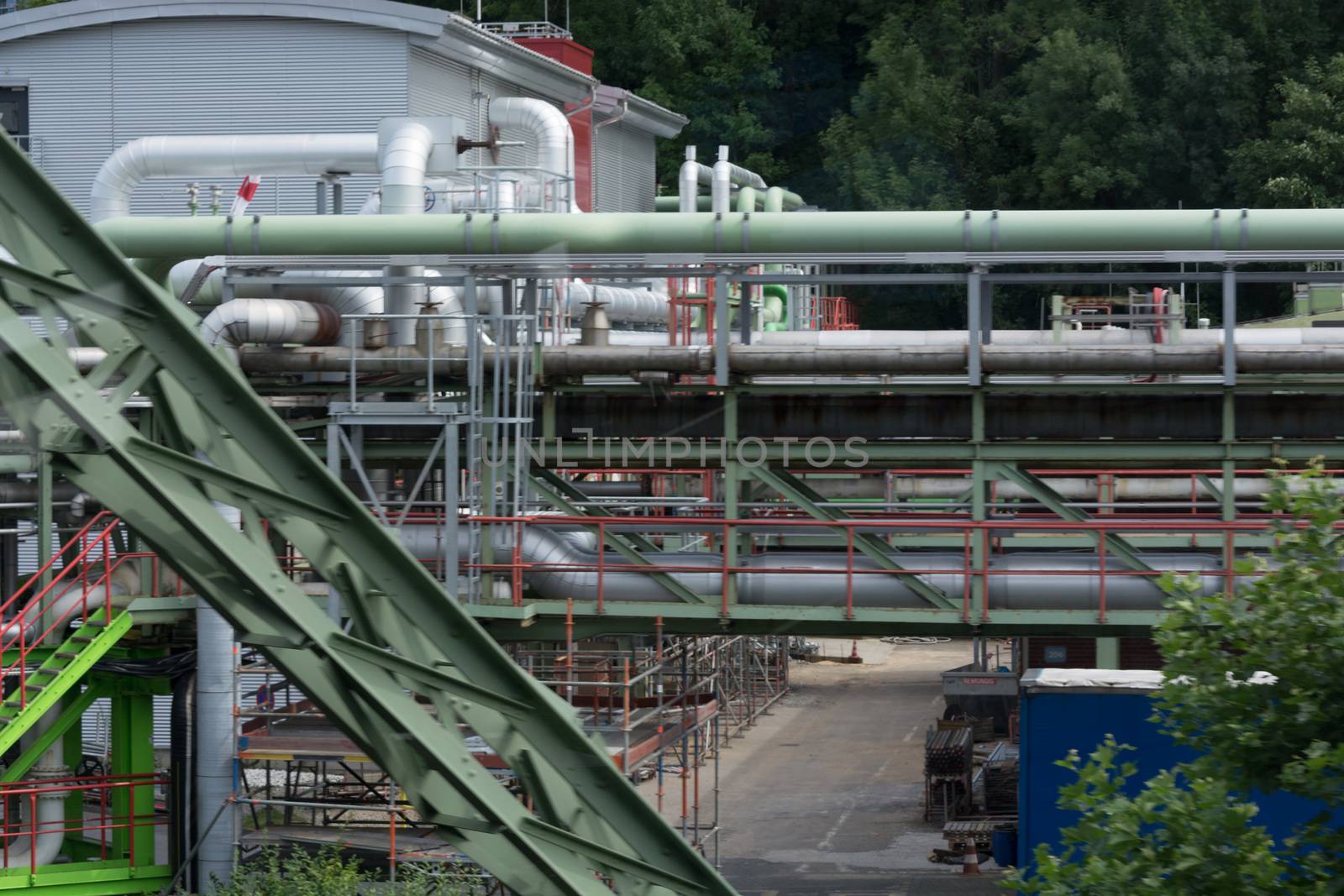 View of pipelines and towers of the oil and gas refinery.