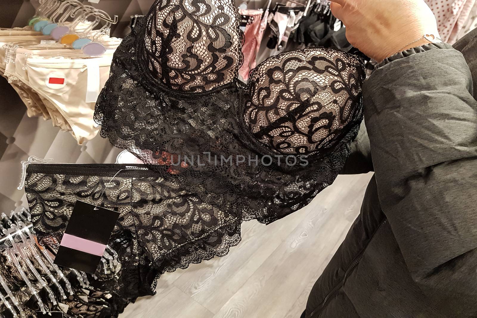 Woman shopping for bra    by JFsPic