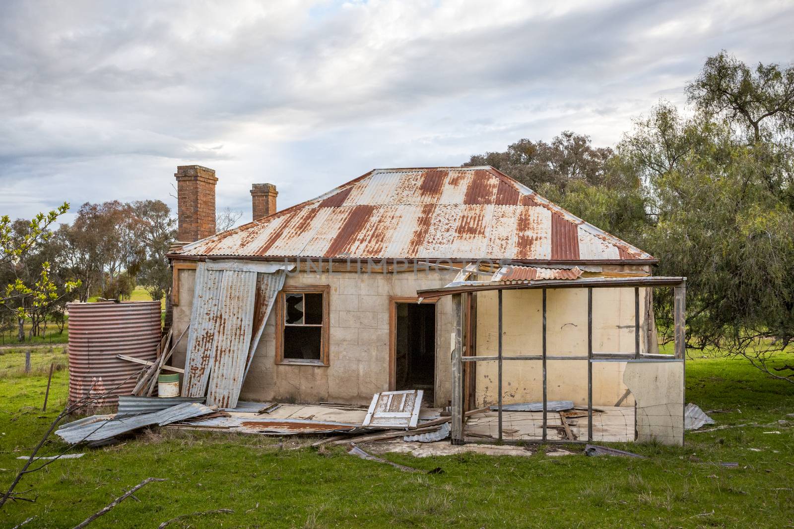 Old abandoned farm house tumbling into ruin by lovleah