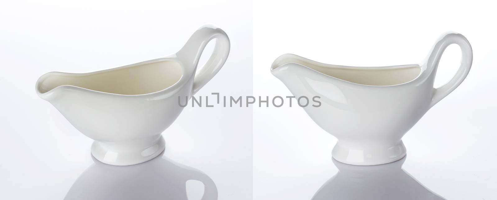 Empty ceramic creamer for cream or milk isolated on white background