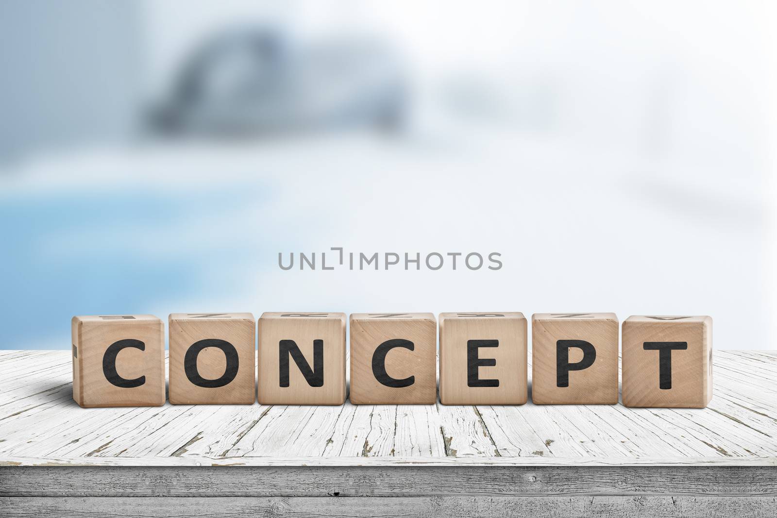 Concept word sign on a wooden desk with a blurry blue background