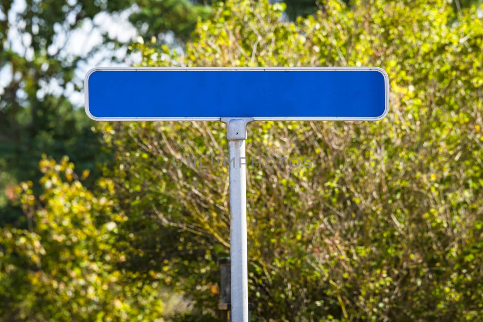 Blue street sign with no text by Sportactive
