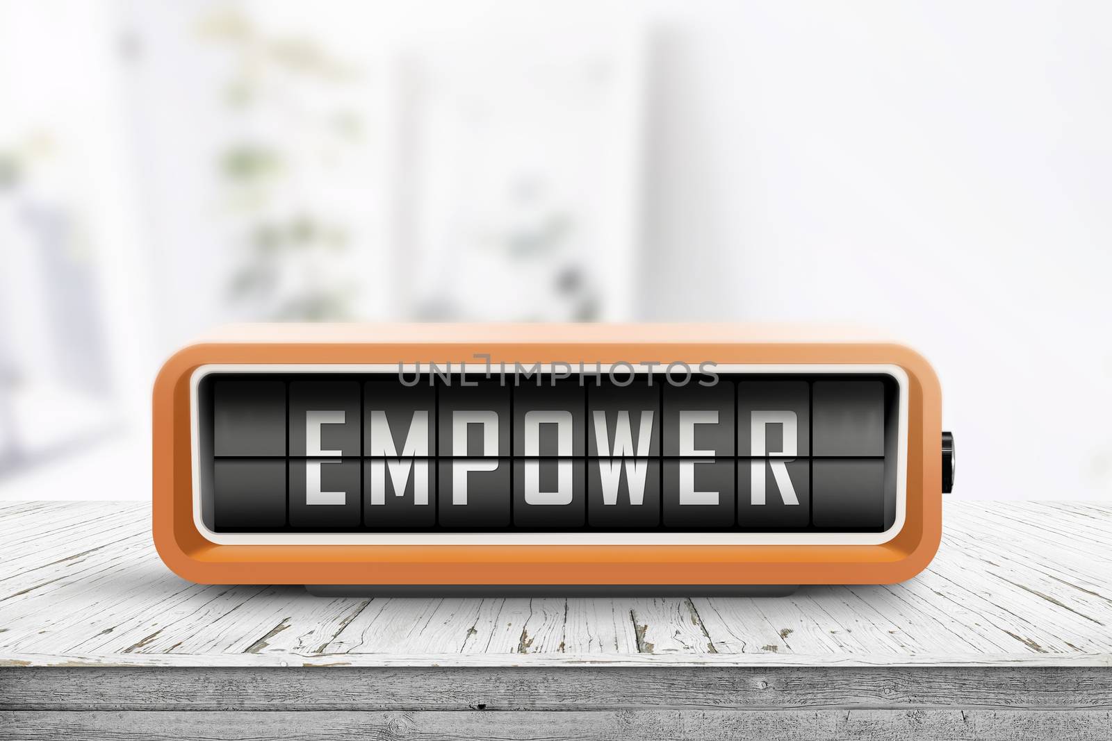 Empower message sign on a wooden desk by Sportactive