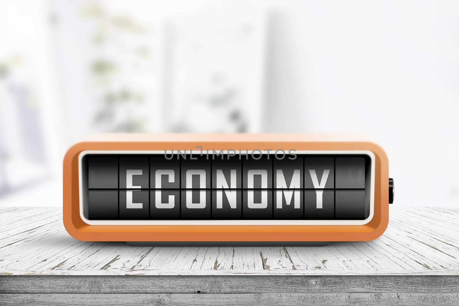 Economy word on an analog device in a bright home by Sportactive
