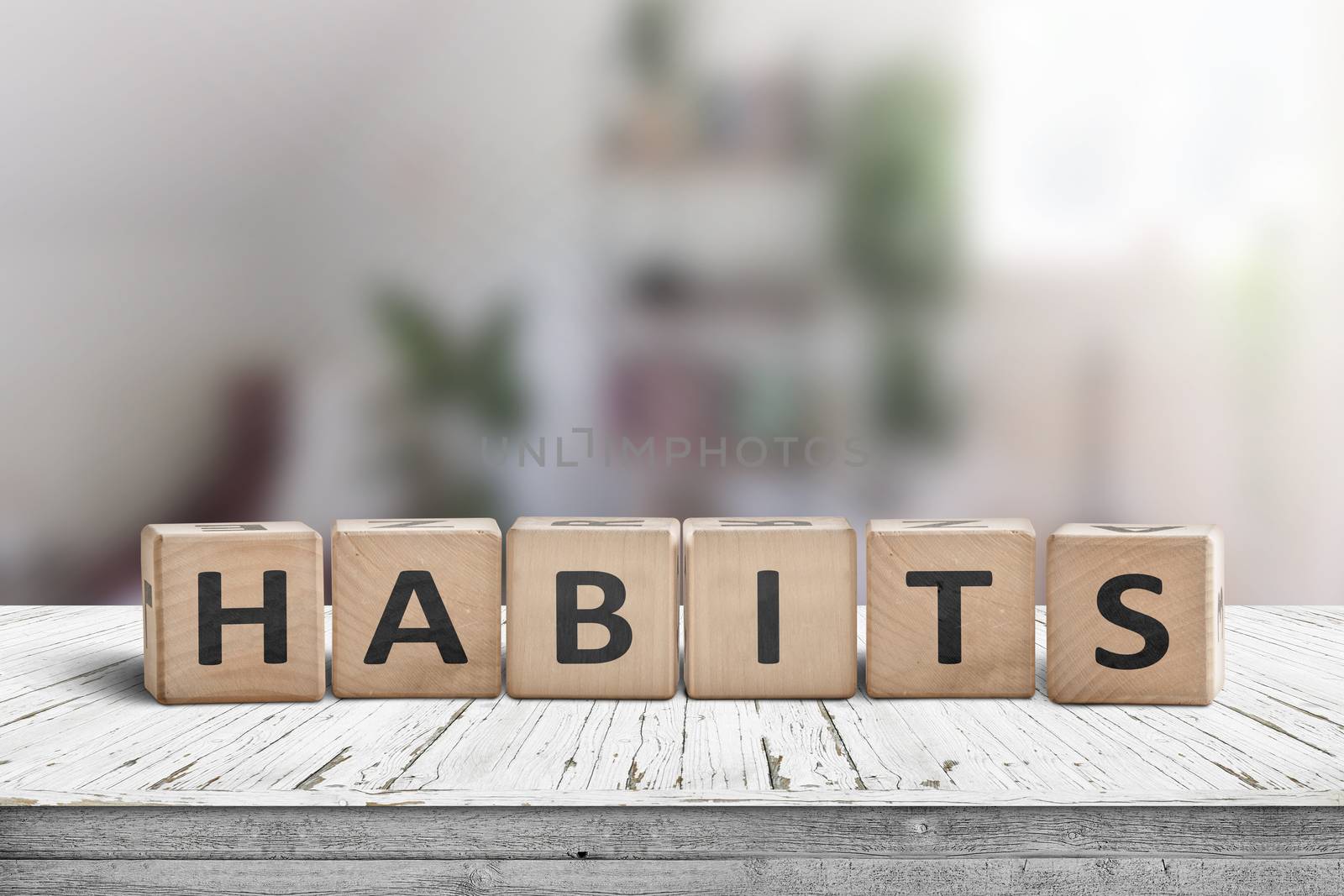 What is your habits? Sign with the word habits on a wooden desk in a bright room