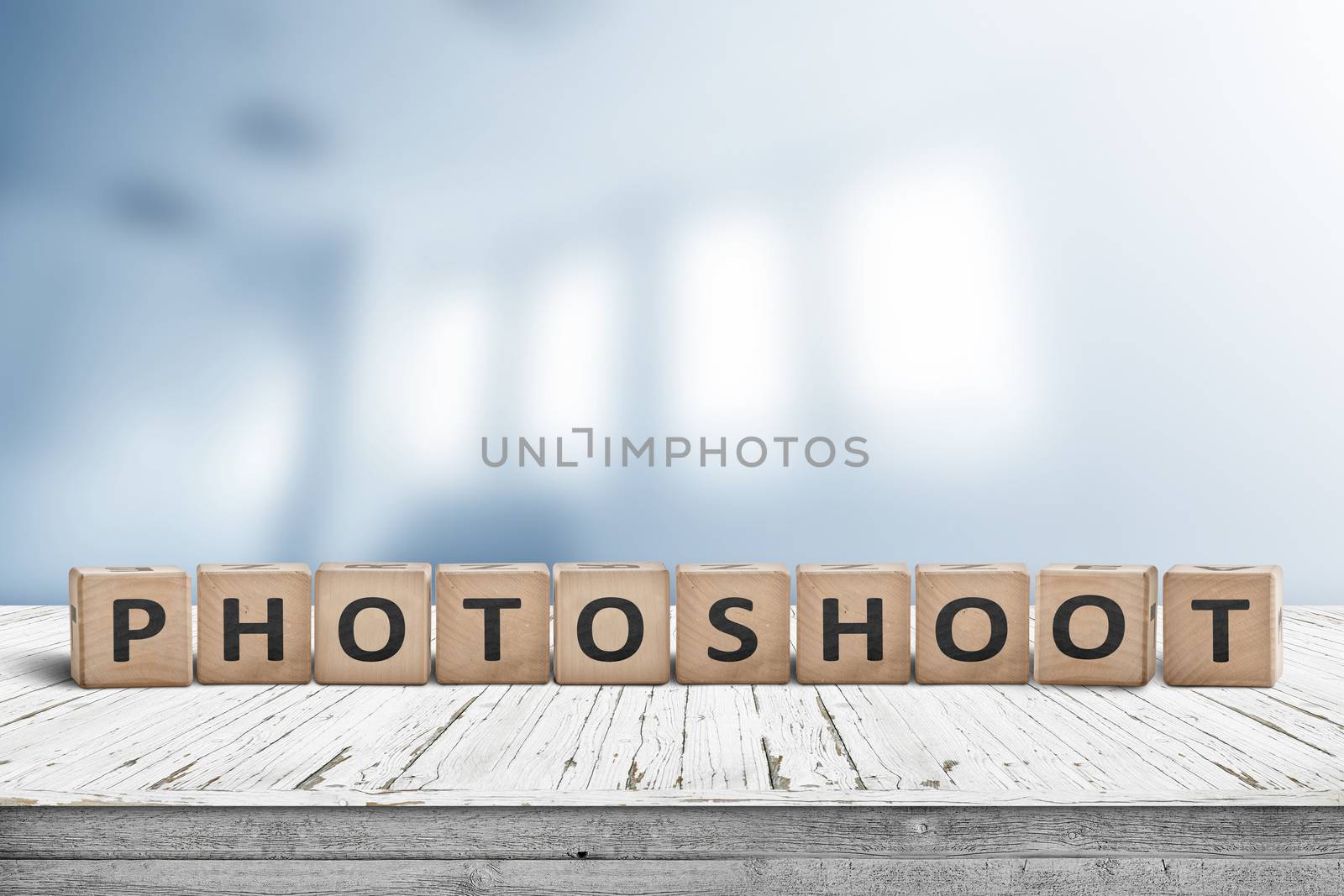 Photoshoot word sign on a wooden desk by Sportactive
