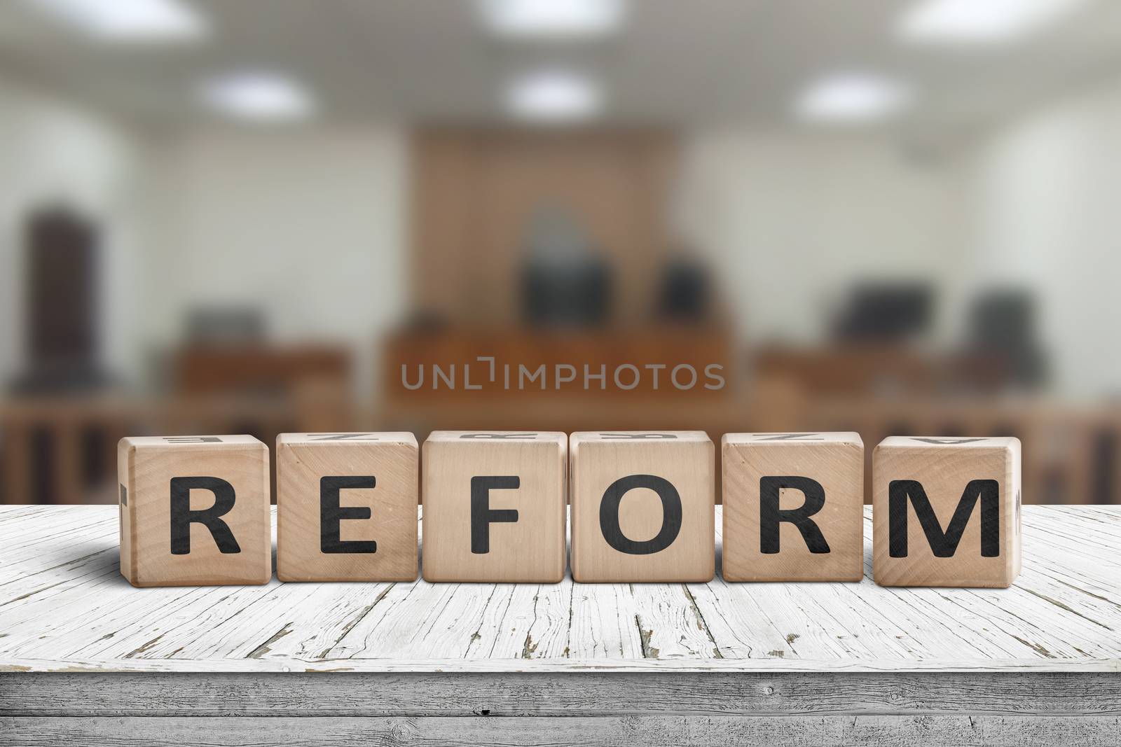 Reform sign on a desk with a blurry background by Sportactive
