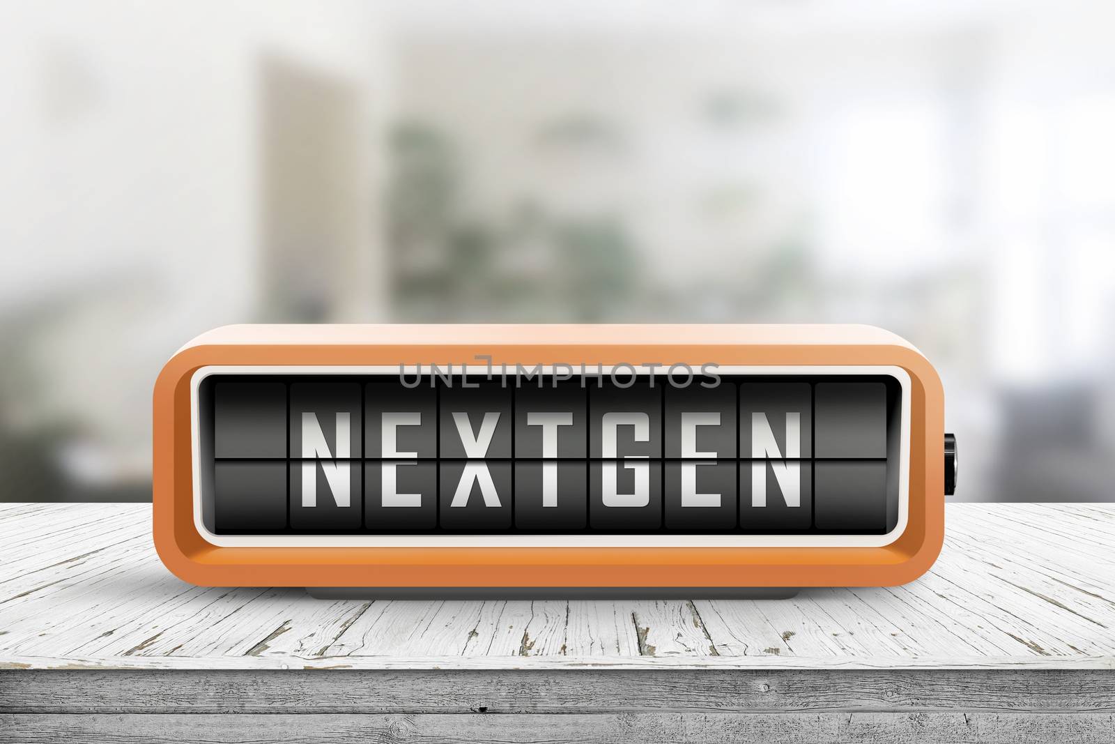 Nextgen word on an alarm device in orange color on a wooden desk in a living room