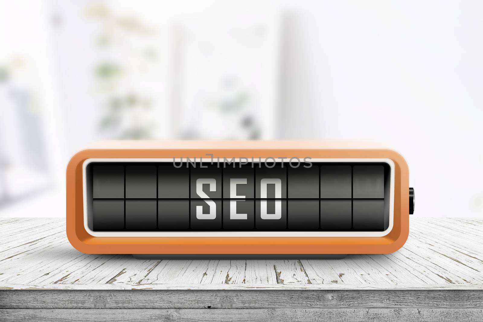 SEO message sign alarm clock in a bright room with a wooden desk