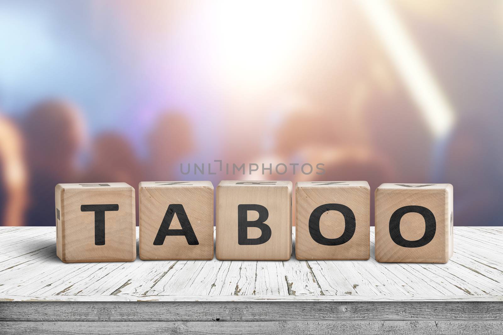 Taboo sign on a table in a night club with lights and people