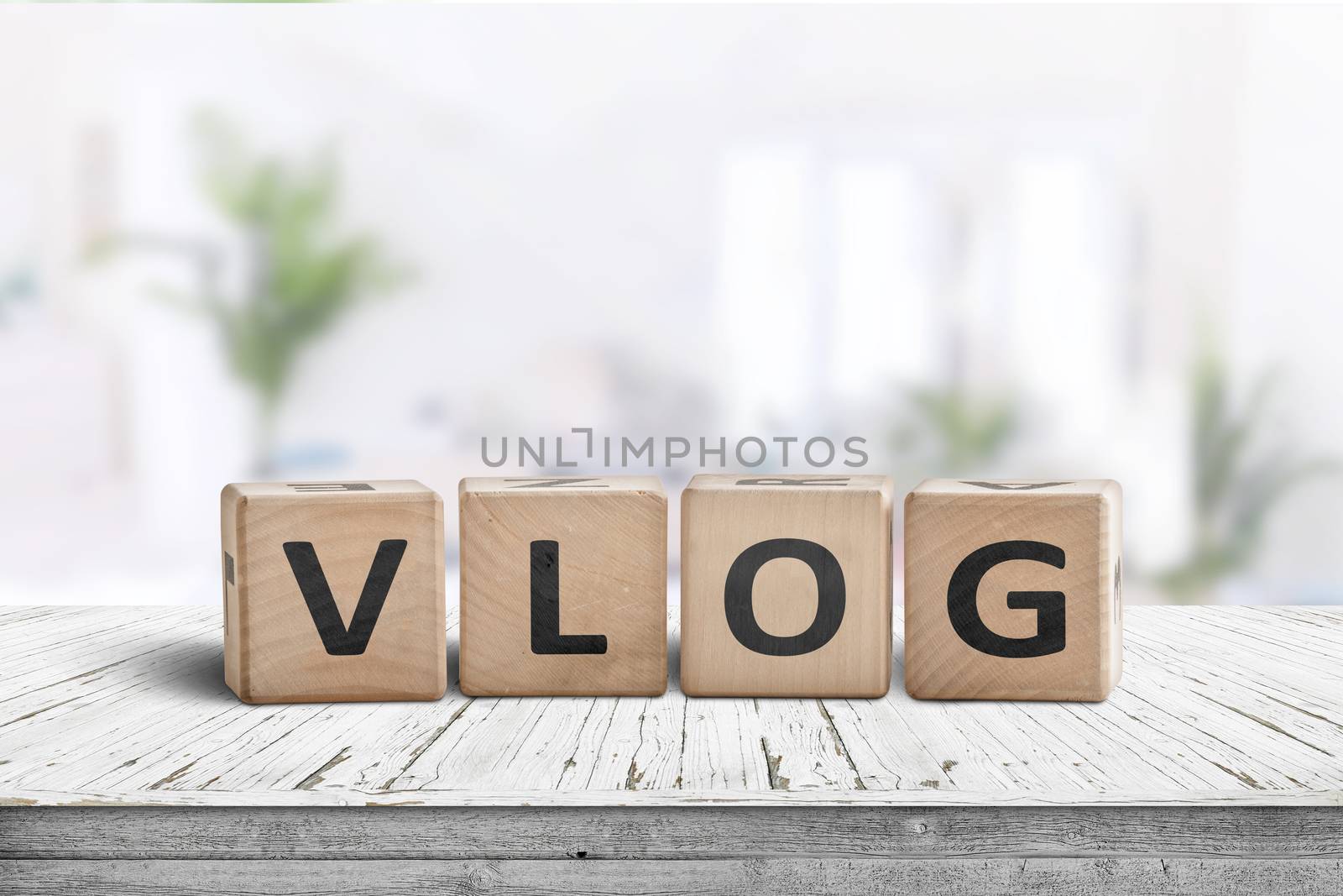 Vlog sign on a desk in a bright living room by Sportactive